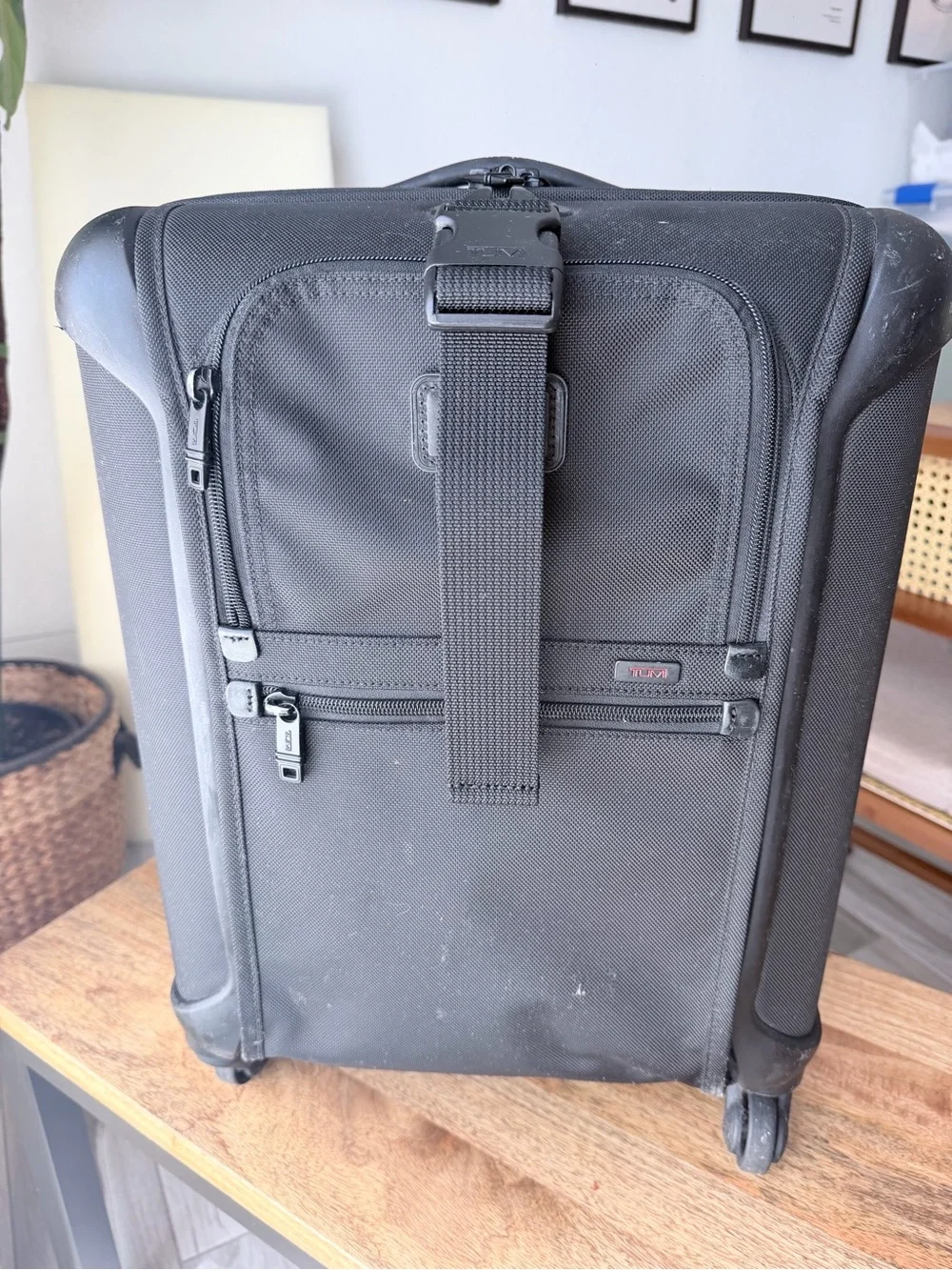 Tumi Alpha Black Carry-On Spinner with Front Strap